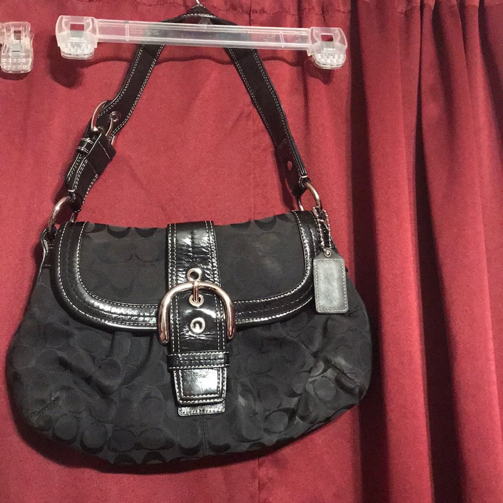 Black and gray coach purse